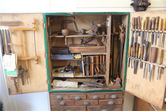 A tool cabinet with old tools, H.162cm